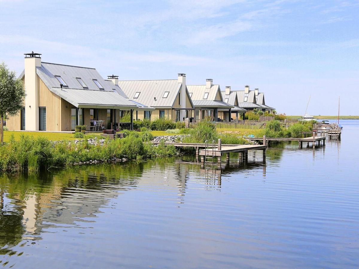 Modern Lodge On The Water In A National Park Tholen Exterior photo