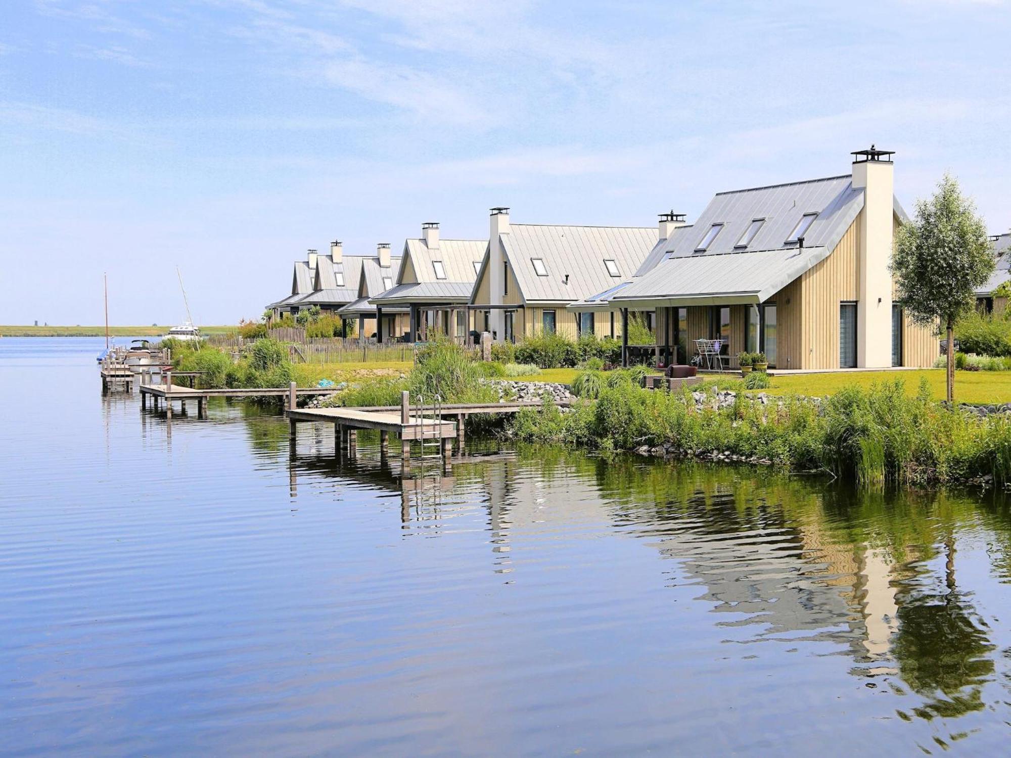 Modern Lodge On The Water In A National Park Tholen Exterior photo